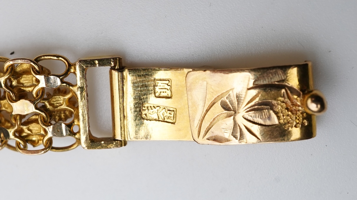 A Chinese pendant necklace and two gold bracelets